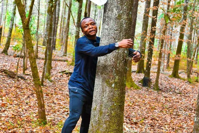 Ghanaian Activist Sets Tree Hugging Record for Conservation